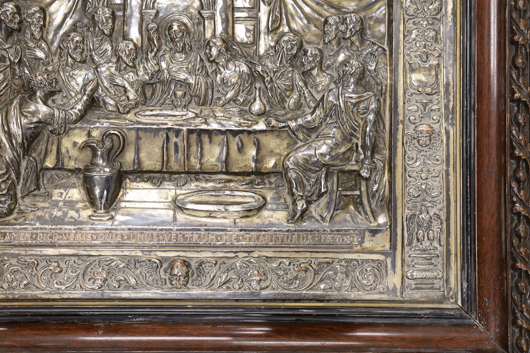 A framed embossed plaque, The Last Supper, silver plate on copper, 34.5 x 50cm excl frame
